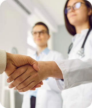 A doctor shaking hands