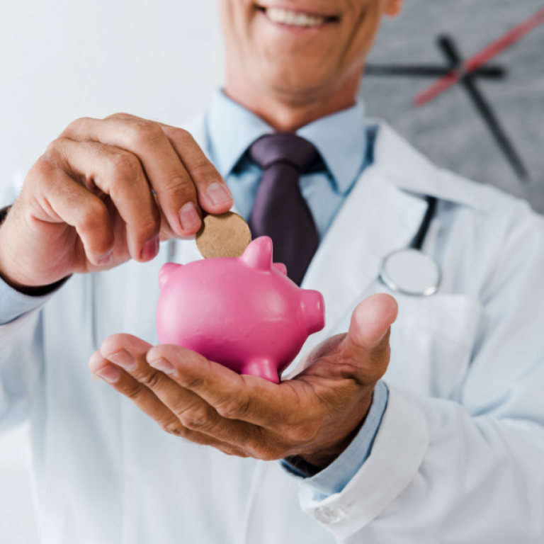 This a doctor happily placing a coin into a piggy bank